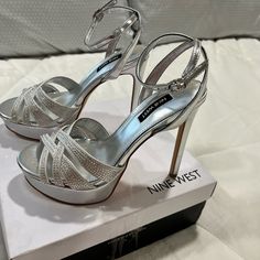 Heel Height: 4.8” Heel Type: Platform Platform Height: 1.18” Color: Silver Shimmer Suede Fashion Shoes Sandals, Nine West Shoes, Silver Heels, Nine West, Platform Sandals, Shoes Women Heels, Shoes Sandals, Heel Height, Shoes Heels