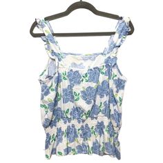 Brand: DRAPER JAMES Style: TOP SLEEVELESS Color: BLUE & WHITE Size: L SKU: 293-29312-80353 CONDITION: GENTLY USED Blue Floral Print Sleeveless Top, Blue Sleeveless Floral Print Top, Blue Floral Print Tank Top, Blue Vest Tops For Vacation, Casual Floral Print Camisole For Daywear, Floral Print Sleeveless Camisole For Daywear, Sleeveless Floral Print Camisole For Daywear, Blue Tank Top For Spring Daywear, Blue Tank Top For Daywear In Spring