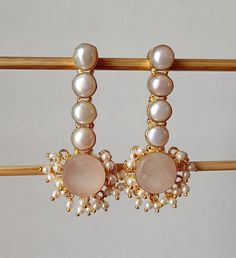 Pure 18K Gold Plated  With Natural Gemstone Earring Rose Quartz Earrings, Gemstone Dangle Earrings, Gem and Pearl Earrings,Pink Cluster Earrings,Romantic Jewelry,Bridesmaid gift,Earrings Gift Earring length  = 60 MM  Earring width    = 25 MM Important Care Tips: We recommend taking your jewelry off for the shower, pool or spa. Also remove when sleeping or exercising and avoid contact with perfume and chemicals. For cleaning we recommend using a soft lint free cloth.  Please store in a cool dry p Bridesmaid Gifts Earrings, Romantic Jewelry, Rose Quartz Earrings, Earrings Gemstone, Romantic Jewellery, Jewelry Bridesmaid, Earrings Pink, Quartz Rose, Cluster Earrings