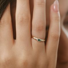 "Emerald Ring / 14k Solid Gold with Marquise Emerald Ring in Halo Setting with Round Pave Diamonds by Ferkos Fine Jewelry / May Birthstone Item Details  * Made to Order * Gold Kt: 14K (also available in 18K) * Available Gold Color: Rose Gold, Yellow Gold, White Gold * Round Diamond: 12 pcs 1.0 MM * Marquise Emerald: 1 pc 4 X 2 MM * Diamond Carat Weight: 0.07 ctw * Emerald Carat Weight: 0.10 ctw * Diamond Color-Clarity: G Color SI Clarity If you have any additional questions about this ring, just hit the \"Message Ferko\" button and we will get back to you within a few hours. ▶ See more of our Emerald Jewelry - https://etsy.me/3QCyZBQ ▶ See our storefront here - http://etsy.me/2lUcVnH  ▶ All store sections here * Diamond Rings - http://etsy.me/2lwKUl8 * Diamond Earrings - http://etsy.me/2ly Multi-stone Round Cut Emerald Ring, Emerald Multi-stone Round Cut Ring, Round Cut Multi-stone Emerald Ring, Multi-stone Round Jewelry For May Birthstone, Elegant Diamond Turquoise Ring For Anniversary, Diamond Multi-stone Emerald Ring For May Birthstone, Marquise Emerald Diamond Ring, Fine Jewelry Turquoise Ring With Accent Stones, Elegant Turquoise Diamond Ring For Anniversary