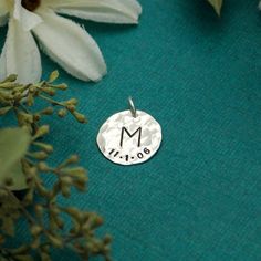 "Mother or Grandmother Charm with Initial and Birthdate Sterling Silver Hand Stamped Personalized Gift A single sterling silver hand stamped charm, 5/8\", personalized with the initial of your child with the date along the bottom edge. This item DOES NOT come with a chain. Gift jewelry necklace for mother, mom, mommy, grandmother, grandma, grandmom, mom mom, nana, nanny, grammy ----------------------------------------------------------------------------------- **Remember, when ordering list the Necklace For Mother, Remember When, Gift Jewelry, Nanny, Jewelry Necklace, Hand Stamped, Jewelry Gifts, Initials, Charms