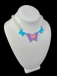 Be the most magical version of yourself this festival season with our Festival Fairy collection ✨ – Perfect for a fairy rave vibe 🦋💜 – Made with lightweight acrylic for comfortable wear all day and night – Adjustable 16"-18" – Made with lavender or pink acrylic with iridescent accents Purple Whimsical Necklace For Party, Whimsical Purple Necklace For Party, Pink Rave Jewelry For Festival, Rave Style Plastic Jewelry For Festivals, Trendy Purple Plastic Jewelry, Rave Vibe, Rave Necklace, Butterfly Festival, Fairy Rave