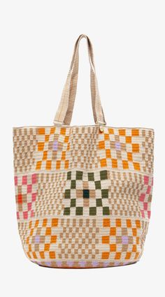 Guanabana's classic tote bag has transformed the classic shopping bag with eye-catching geometric designs and vibrant hues, giving it a unique chic and bohemian vibe. Designed in Madrid and expertly hand-woven by Wayuu artisans in Colombia, this bag features a loose knit and a long, comfortable strap, making it a go-to accessory. The result is a versatile unisex bag that you'll find indispensable. The artisans weave the bases using their designs, so each base is unique and works as their tradema Artisan Tote Bag For Shopping, Modern Bags With Leather Handles For Market, Bohemian Woven Bucket Bag For Shopping, Multicolor Handwoven Crochet Tote Bag, Bohemian Woven Hobo Bag For Shopping, Bohemian Woven Shoulder Bag For Shopping, Multicolor Crochet Bag With Braided Handles For Shopping, Multicolor Top Handle Bags, Modern Rectangular Bags For Market