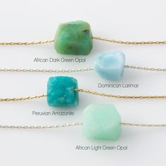 "Choose from Amazonite, Larimar or Opal and we'll create a one of a kind boho crystal necklace just for you. Dainty gemstone necklaces are simple, minimal, perfect for layering and everyday wear. The beautiful crystal stone is hand strung on a 14K Gold Fill or Sterling Silver snake chain. A classic Gift for Her, birthday gift, bridesmaid gift, Mother's Day gift or Galentines gift. *listing is for one Dainty Stone Necklace | DETAILS | - 14k gold fill or Sterling Silver snake chain with spring clo Dainty Gemstone Necklace, Galentines Gifts, Raw Stone Necklace, Boho Crystal, Green Garnet, Garnet Necklace, Silver Snake Chain, Gold Choker, Solid Gold Jewelry