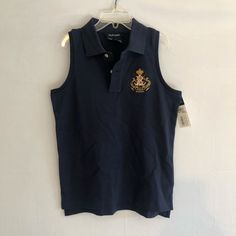 Dark Blue Sleeveless Collared Shirt With Large Polo Logo, Kids Large 12-14 Navy Sleeveless Cotton Vest, Blue Cotton Sleeveless Tank Top, Blue Cotton Sleeveless Top, Fitted Navy Sleeveless Vest, Casual Blue Sleeveless Vest, Navy Sleeveless Vest Top, Blue Sleeveless Vest Top, Navy Casual Cotton Tank Top, Navy Ralph Lauren Cotton Tops