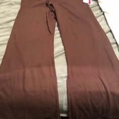 Size Medium Brown And White Sweatpants. High Waist Solid Color Lounging Pants, High-waist Stretch Bottoms For Lounging, High Waist Stretch Bottoms For Lounging, High Waist Solid Pants For Lounging, High Waist Solid Color Lounge Pants, High Waist Bottoms For Lounging, Solid High Waist Bottoms For Lounging, Casual Fitted Sleepwear With Elastic Waistband, Fitted Casual Sleepwear With Elastic Waistband