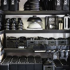 the shelves are filled with black and white items