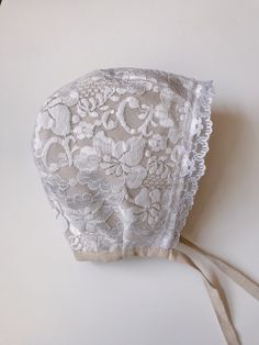 Handmade bonnet with beige and white patterns & lace. 100 % cotton fabric. Very comfy for your baby to wear. Cute and  protective as well. Protective from wind.  *Comes in sizes 0-3 months and older, all the way up to 3 years old:) Fitted White Bonnet With Lace Trim, White Adjustable Lace Bonnet, White Lace Adjustable Bonnet, Adjustable Cotton Bonnet With Lace Trim, Fitted Cotton Bonnet With Lace Trim, Fitted Cream Bonnet With Lace Trim, Fitted Vintage Bonnet With Lace Trim, Adjustable Cream Bonnet For Baptism, Fitted White Bonnet For Baptism