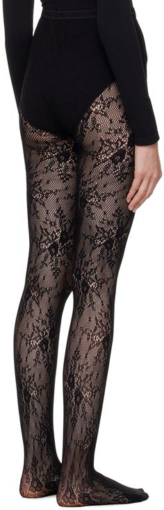 Semi-sheer stretch ECONYL® recycled nylon lace tights in black. · Floral pattern throughout · Elasticized waistband · Reinforced toes · Partial cotton jersey lining Supplier color: Black Stretch Lace Stockings With Lace Trim, Spring Fitted Tights With Lace Trim, Fitted Lace Legwear With Lace Trim, Fitted Lace Sheer Legwear, Thigh-high Tights With Lace Trim, Thigh High Tights With Lace Trim, Sheer Fitted Lace Hosiery, Spring Fitted Lace Hosiery, Fitted Lace Thigh-high Tights