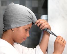 "Tired of wondering what causes split ends, hair breakage and that disrespectful dry, frizzy curly hair? We've been there & feel your pain! Prevent split ends, have full frizz control with our stylish, lightweight, super absorbent, cotton interlock, t-shirt hair towel wraps. Simply attach the elastic to the coconut shell button. They are the best towels for your curly natural hair, and the healthiest. . Visit our new shop http://etsy.com/shop/fraisbybreezytee * If you have fuller hair, our f Dry Frizzy Curly Hair, Best Towels, Hair Plopping, Curly Natural Hair, Split Ends Hair, Frizzy Curly Hair, Dry Curly Hair, Hair Towel Wrap, Hooded Tee