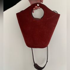 Double Handles. Snap Closure. Removable Shoulder Strap 2 Interior Pockets, One With A Zipper Closure Leather / Suede In Deep Burnt Red 17”W X 6.5”D X 15.75”H 4” Handle Drop, 14.5” Strap Drop Red Bag With Round Handle For Everyday Use, Red Bucket Bag With Top Carry Handle, Red Shoulder Bag With Round Handle For Daily Use, Modern Red Bucket Bag With Detachable Handle, Everyday Red Bucket Bag With Top Handle, Everyday Red Bucket Bag With Top Carry Handle, Red Shoulder Bag With Round Handle For Shopping, Red Bucket Bag With Top Carry Handle For Everyday, Modern Red Bucket Bag For Evening