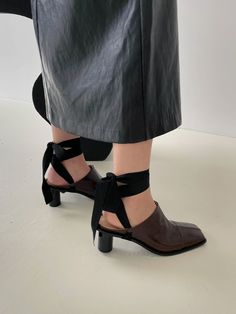 Editor's NoteOI PAINTED's shoe will add elegance to your daily outlook- Modern chic square toe - Soft and subtle gloss leather texture- Set on a stacked heel- Manish mood and unique silhouette- Daily point itemMeasurements (in.)- Heel: 2.5in.- Size: US 5.5(KR225mm) - US 8 (KR250mm)- This item is based on the KR shoe size. Please refer to the size chart.Composition & Care- Upper: Sheepskin- Lining: Synthetic leather- Outsole: Rubber- Professional leather care onlyDesigner- by OI PAINTED Sleek Leather Block Heels With Wrapped Heel, Chic Block Heels With Leather Sole And Square Toe, Square Toe Patent Leather Block Heels With Heel Strap, Square Toe Heels With Heel Strap For Fall, Fall Heels With Heel Strap And Square Toe, Leather Block Heels With Wrapped Heel And Almond Toe, Chic Brown Block Heels With Square Toe, Chic Brown Square Toe Block Heels, Modern Brown Block Heels With Sculpted Heel