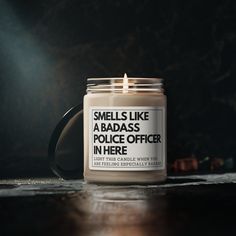 Looking for a funny police officer gift? This Smells Like A Badass Police Officer candle is for you!  Perfect for both men and women who investigate crimes. Makes a great birthday, Christmas, Valentine's Day, graduation, Mother's Day, or Father's Day gift for anyone who works as a cop. Packed with immersive aromas, these scented candles come in 9oz glass jars and are one size (2.8″ × 3.5") (7.1cm × 8.8cm).  Made with 100% natural soy wax blend, each candle features a 100% cotton wick and a perma Police Appreciation Gifts, Gifts For Police Officers, Police Academy Graduation Gift, Police Retirement Party, Funny Police, Police Academy Graduation, Police Officer Wife, Gifts For Cops, Police Retirement