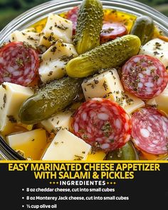 a bowl filled with cheese and pickles on top of a wooden table next to an advertisement