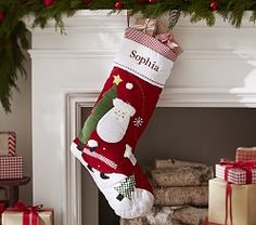 a christmas stocking hanging from a mantel