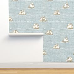 a wallpaper with sailboats and ships on the ocean in pastel blue color