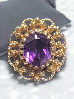 VINTAGE AMETHYST 14K YELLOW GOLD FILIGREE RING Beautifully crafted in 14k yellow gold, this 3CT Oval cut Amethyst Solitaire Ring is sure to please! This item is vintage and in excellent condition.  It is sure to be one of your favorite pieces!      Purple Vivid Hue     4.7 Grams  Shipped insured/delivery confirmation I guarantee item to be exactly as described and pictured. Black Opal Pendant, Filigree Ring Gold, Amethyst Jewelry, Gold Filigree, Filigree Ring, Opal Pendants, Black Opal, Star Pendant, Amethyst Ring