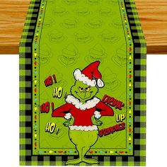 an image of the grin christmas door hanger