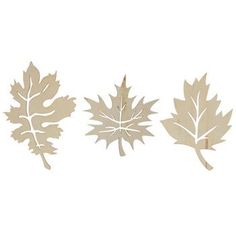 three leaf cutouts are shown on a white background, one is brown and the other is beige