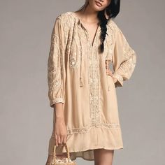 Size Xs Neutral Htf By Anthropologie Deco Tunic Dress. This Boho Dress Features Lovely Embroidery. Nwt. - Cotton, Viscose; Polyester Embroidery - Pullover Styling - Hand Wash Dimensions - Standard: Falls 34.5" From Shoulder - Reviews Say Runs Large, Size Down For More Fitted Look Chic Beige Boho Dress For Brunch, Elegant Beige Embroidered Dress For Spring, Summer Embroidered Beige Midi Dress, Chic Beige Floral Embroidery Dress, Chic Beige Embroidered Dress, Beige V-neck Embroidered Dress, Casual Beige Embroidered Dress For Spring, Embroidered Beige Midi Dress, Embroidered Beige Mini Dress For Spring