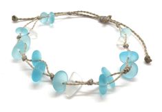 Gorgeous beach bracelet or anklet made with light aqua blue sea glass pebbles on our durable hand spun rope cord. Pure island style! Easy and secure adjustable slide knot closure allows for easy on and off. This bracelet/anklet is completely waterproof and metal free making it perfect for anyone with skin sensitivities and is a wonderful and unique gift for those hard to shop for friends and family on your list, especially the beach lovers! Color: Aqua Blue Size: Available in three sizes. Bracel Handmade Adjustable Sea Glass Bracelets, Adjustable Ocean-inspired Sea Glass Jewelry, Adjustable Recycled Glass Beaded Bracelets For Beach, Beaded Sea Glass Jewelry For Beach, Adjustable Turquoise Glass Bracelets, Beach Beaded Sea Glass Jewelry, Blue Glass Beaded Bracelets For Beach, Beach Glass Bracelet Jewelry, Casual Beach Glass Jewelry