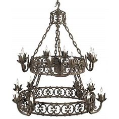 an old fashioned chandelier with candles hanging from it's center and arms