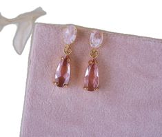 Pink Pear-shaped Earrings For Gift, Pink Teardrop Earrings For Gift, Feminine Teardrop Earrings As Gift, Feminine Teardrop Earrings For Gifts, Rose Gold Teardrop Pendant Earrings For Gift, Elegant Pink Teardrop Earrings As Gift, Feminine Rose Gold Teardrop Earrings, Elegant Pink Teardrop Earrings For Gift, Rose Gold Teardrop Crystal Earrings