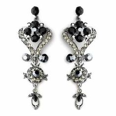 Black Crystal Chandelier Earrings These dramatic silver plated crystal earrings are beautifully designed with a vintage inspired brocade design. Both clear and black crystals give lots of sparkle! Perfect for your wedding day, prom or any special occasion in need of a glamorous touch. Size: Earrings are about 3" long and 1" wide. color: Silver/ Black. Style: 1031b. Perfect for the bride, her bridesmaids or for your quinceanera or prom! Need more than one pair for your bridesmaids or damas? You c Black And Silver Prom, Homecoming Jewelry, Black Onyx Crystal, Black Crystal Chandelier, Wedding Earrings Chandelier, Emerald Green Earrings, Onyx Crystal, Crystal Chandelier Earrings, Emerald Earrings Studs