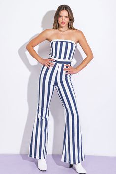 A printed twill jumpsuit featuring straight neckline, flare pant and back zipper closureDetails:Self : 97% Cotton 3% SpandexSize & Fit- Model is 5`8" And Wearing Size Small- Measurements Taken From Size Small- Approx. Length: 53" Spring Flare Fitted Jumpsuits And Rompers, Chic Flare Jumpsuits And Rompers For Spring, Chic Spring Flare Jumpsuits And Rompers, Trendy Striped Fitted Jumpsuits And Rompers, Trendy Fitted Striped Jumpsuits And Rompers, Flare Pant, Straight Neckline, Flare Pants, Fitness Models