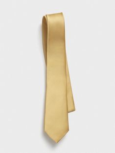 This is the gold standard of ties-literally. Crafted from the finest silk fabric to kick things up a notch. 100% Silk 3 inches wide Suit Prom, Gold Suit, Gold Tie, Senior Prom, Tuxedo Shirts, Gold Silk, Wedding Rentals, Silk Necktie, Ring Fit