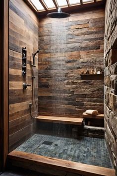 Rustic walk-in shower with a combination of wood and stone design, featuring a rainfall showerhead and modern fixtures. Master Bathrooms With Walk In Showers Stone, Master Bath Theme Ideas, Walk In Shower No Door Rustic, Shower With Wood Beams, Modern Rustic Master Bath Ideas, Modern Rustic Interior Design Bathroom, Wood Shower Door Ideas, Wood Grain Shower Tile, Spa Shower Design