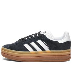 Elevate your style with the adidas Gazelle Bold, literally. Stacked high on three layers of rubber outsole, this classic sneaker boasts buttery-smooth suede uppers. The textured tongue features the adidas logo, while the instantly recognisable 3-Stripes sit on the quarter. An absolute must-have for any sneaker enthusiast..Suede Uppers.Rubber Outsole.Branded Tongue.Serrated 3-Stripes.Lace Closure.Regular Fit Adidas High-top Suede Skate Shoes, High-top Adidas Suede Skate Shoes, Adidas Suede Skate Shoes With White Sole, Adidas High-top Platform Sneakers With Logo, Adidas High-top Platform Sneakers, Adidas Platform Sneakers With Vulcanized Sole For Streetwear, Suede Platform Sneakers With Gum Sole For Streetwear, Adidas High-top Skate Shoes With Rubber Waffle Outsoles, Adidas Gum Sole Platform Sneakers For Streetwear