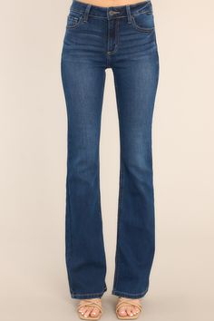 Get ready to flaunt your fun-loving style with our Oh Really Mid Rise Dark Wash Flare Jeans! Their mid-rise fit and dark wash ensure a flattering silhouette while the flare design adds a touch of personality. Perfect for standing out from the crowd with your unique fashion choices! These jeans feature a classic button and zipper closure, belt loops, front and back pockets, a flared cut, and a dark wash. 74% Cotton, 15% Polyester, 10% Rayon, 1% Spandex Machine Wash Cold Imported Model is wearing Oh Really, Dark Wash Flare Jeans, Red Dress Boutique, Fun Loving, Boutique Dresses, Hip Length, Unique Fashion, Flare Jeans, Red Dress