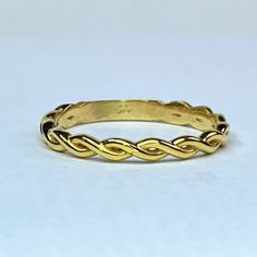 This 14-Karat Yellow Gold Ring Features A Dynamic Twisted Rope Look And Has A Sizing Bar That Makes It Easy To Size The Ring Up Or Down. The Ring Is An Ideal Design For Stacked Ring Arrangements. We Have Different Design Of A Variety Of Stackable Ring Styles To Mix And Match. Ring Width 2.55mm. Size 6-7.5 Match Ring, Strand Braid, Ring Styles, Braided Ring, Stackable Ring, Yellow Gold Ring, Ring Band, Stackable Rings, Yellow Gold Rings