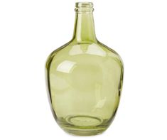 an empty green glass bottle on a white background