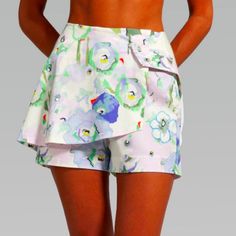 Beautiful Wrap Shorts That You Can Mix And Match Several Tops Or Sweaters, To Create A Look Of Your Own. Feminine Water Color Flowers Print Make It For A Springtime Or Summer Look! Show Off Your Best Asset (Legs!) In This Beautiful Piece! * 100% Cotton Pique * Snap Front Closure * Floral Water Color Print * Wrap Style Mini Shorts * Size Small (4-6) Waist: 27" Hips: 36.5" Brand New, Prices Firm! I Have All My Prices Set Low, So You Get The Best Value. Bundle A Few Items Then I Can Give A Discount White Beachwear Shorts For Daywear, Fitted Summer Shorts With Pockets, Spring Beachwear Shorts For Day Out, Beachwear Bottoms For Daywear In Short Length, Beachwear Bottoms For Daywear, Beachwear Bottoms Short Length For Daywear, Summer Beachwear Shorts For Daywear, Fitted Summer Pants With Short Inseam, Spring Beachwear Shorts