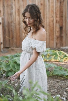 Style // A timeless oatmeal linen dress, our Moon shade is the perfect mix of sand and cream color Effortlessly romantic and oh so pretty, our Menorca Dress is a mid length linen dress designed to transition throughout the year. Pair with sandals for summer or boots for fall and winter. Made from super-soft linen, with puffed sleeves that can be worn the way you love best! Over the shoulder for an elegant square neck line or off-the-shoulder for a feminine touch Fabric Note // Made in Italy from Beige Linen Dress For Summer Brunch, Beige Linen Summer Dress For Brunch, Fitted Cream Linen Summer Dress, Bohemian Linen Dress For Garden Party, Neutral Linen Summer Dress, Beige Linen Dress For Spring Garden Party, Cream Linen Dress For Garden Party, Beige Linen Dress For Summer, Feminine Linen Dress For Beach