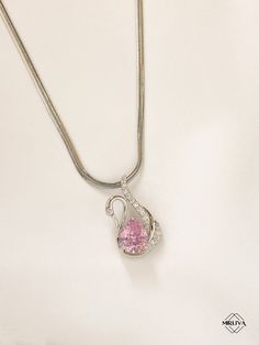 This elegant and stylish swan necklace is adorned with a dazzling large pink zircon stone. Offered in both gold-plated and silver options, this necklace combines modern and classic styles to suit every taste. Its intricate craftsmanship and high-quality materials make it stand out. Perfect as a gift for special occasions, this necklace adds a touch of elegance to any outfit with its eye-catching design. All our jewelry is the most elegant choice for the Bridesmaids, friends, your loved ones and Pink Teardrop Pendant Necklace For Anniversary, Pink Snake Chain Jewelry Gift, Swan Jewelry, Swan Pendant, Swan Necklace, Pink Zircon, Silver Swan, Zircon Gemstone, Necklace Elegant