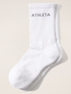 FOR: Life on and off the mat FEEL: Cotton-stretch feels plush and holds tough from wash to wear FAVE: Lofty terry fabrication cushions the heel and ball of your foot Ribbing provides extra comfort S/M = 4-6.5 M/L = 7-9.5. Comfortable Sports Socks With Letter Print, Comfortable Sweat-resistant Gym Socks, Comfortable Sweat-resistant Socks For Gym, White Stretch Athleisure Socks, White Athleisure Socks For Gym, White Sports Socks With Letter Print, Sporty Stretch Socks For Gym, Sports Cotton Socks With Letter Print, Work And Travel