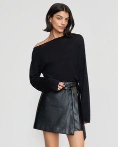 A mini skirt with a subtle edge in a soft vegan leather adds effortless polish to any wardrobe. Pair with everything from a black blouse in warmer weather to a chunky knit for a cozy look. See below for our general Size Guide and available measurements Self made of 100% polyurethane, lining made of 100% polyester Machine wash cold and lay flat to dry Versatile Black Skirt For Fall, Chic Asymmetrical Mini Skirt For Fall, Fall Mini Skirt In Sleek Style, Fall Sleek Mini Skirt, Chic Relaxed Skirt For Layering, Sleek Mini Skirt For Night Out In Fall, Sleek Mini Skirt For Fall Night Out, Sleek Black Skirt For Fall, Chic Layering Skirt