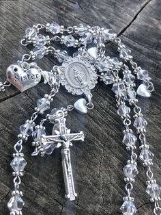 Sister Themed Catholic Rosary. #catholic #catholicchurch #catholicism #catholicfaith #VirginMary #sister #MotherMary #catholics #catholicteens #pray #catholicfaith #catholicfamily #eucharist #praytherosaryeveryday #sisterhood  #bodyofchrist  #MotherMary #jesus #crucifix #Catholicmom #divinemercy  #pray #sistersister #prayers #eucharist #praytherosary #AveMaria #knightsofcolumbus #bodyofchrist #sistergift Silver Jewelry With 8mm Beads For Valentine's Day, Silver 8mm Beads Jewelry For Valentine's Day, Valentine's Day Silver Jewelry With 8mm Beads, Silver Round Bead Necklaces For Mother's Day, Silver Round Beads Necklace For Mother's Day, Gift Jewelry With 8mm Crystal Beads, Spiritual 8mm Beads Jewelry For Birthday, Silver Necklaces With Round Beads For Birthdays, Silver Necklaces With Round Beads For Birthday