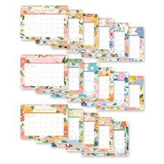 four calendars with floral designs on each side and one in the middle, all lined up