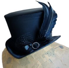 Gothic Fitted Hat With Short Brim, Gothic Fitted Brimmed Top Hat, Steampunk Fitted Top Hat For Themed Events, Fitted Steampunk Top Hat For Themed Events, Fitted Gothic Brimmed Top Hat, Fitted Brimmed Top Hat For Themed Events, Gothic High Crown Top Hat, Gothic Top Hat With High Crown, Gothic High Crown Top Hat For Themed Events