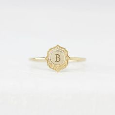 Introducing the 'Lettering Sonnet' from the Impasto Collection, a 14K yellow gold vintage signet ring that blends timeless elegance with personalized charm. This size 6 ring offers the unique opportunity to customize with your choice of lettering, making each piece as individual as the wearer's own story. Timeless Personalized 14k Gold Initial Ring, Antique Personalized Signet Ring For Formal Occasions, Elegant 14k Gold Initial Ring With Engraving Option, Timeless Personalized Gold Signet Ring, Timeless Engraved 14k Gold Initial Ring, Timeless Yellow Gold Initial Ring With Monogram, Personalized 14k Yellow Gold Signet Ring, Antique Personalized Yellow Gold Signet Ring, Classic Personalized Yellow Gold Signet Ring