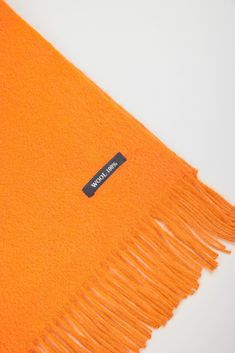 - Measurements: 1. Width: 30cm, 2. Length: 180cm- Materials: 100% wool- Thickness: Thick- Sheerness: None- Stretch: Low- Lining: None- Care: Hand wash cold Classic Cashmere Scarves, Classic Solid Cashmere Scarves, Classic Wool Scarves For Fall, London Free, Winter Warmers, Orange Fashion, Buy Now Pay Later, Orange Color, Fashion Brand