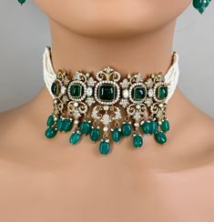 Emerald victorian uncut Polki Kundan Choker, Sabyasachi Designer necklace, Bollywood, Indian Pakistani Jewelry for Wedding, bridal jewelry Premium Dual Tone uncut Polki Kundan Choker/Sabyasachi Choker/Indian/Bollywood Jewelry/Fine Kundan Necklace/Pakistani/Punjabi/Statement Set Regular Size And Adjustable Ships from California, USA Delivery in 2-5 business days in the USA. Other designs can be found here https://www.etsy.com/listing/1381240765/premium-quality-gold-plated-silver?click_key=e1a9e46c1ba3dcb2d7ddeb00610b709b7497bd62%3A1381240765&click_sum=5b5797e9&ref=shop_home_active_511&pro=1&frs=1&sts=1 https://www.etsy.com/listing/1266279586/premium-quality-gold-plated-silver?click_key=ac3f9678a67e3cb7b0f157cdf3d63e11bd1206cf%3A1266279586&click_sum=258e6572&ref=shop_home_active_20&pro=1&frs Bollywood Bridal Necklace For Reception With Intricate Design, Elegant Heavy Traditional Wear For Reception, Bollywood Bridal Necklace With Cutdana For Reception, Heavy Bridal Necklace For Reception At Diwali, Green Bollywood Bridal Sets For Reception, Green Tilla Bridal Necklace For Reception, Green Bridal Sets For Diwali Reception, Diwali Reception Green Bridal Sets, Festive Reception Tikka With Intricate Design