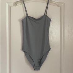 Brand New Never Worn Topshop Grey Bodysuit Gray Sleeveless Swimwear For Summer, Sleeveless Gray Swimwear For Summer, Fitted Gray Summer Bodysuit, Gray Sleeveless Bodysuit For Spring, Spring Sleeveless Gray Bodysuit, Trendy Summer Gray Bodysuit, Gray Casual Summer Bodysuit, Casual Gray Summer Bodysuit, Fitted Gray Summer Swimwear