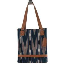 Looking for a uniquely gorgeous structured bag? Look no further! The jaspe (ikat) structured tote is made of handspun and handwoven fabric designed by the women of Ruk’U’X Keem of San Juan La Laguna, Guatemala. Cuero Malec, a Guatemalan leather shop, transforms the fabric into gorgeous, durable bags. Square Woven Bags For Everyday Use, Square Woven Bag For Everyday Use, Artisan Handwoven Shoulder Bag For Shopping, Daily Use Tote Shoulder Bag With Weaving Work, Brown Shoulder Bag With Weaving Work For Daily Use, Brown Tote Shoulder Bag With Weaving Work, Artisan Shoulder Bag With Leather Handles, Artisan Handwoven Shoulder Bag For Everyday, Brown Weaving Work Tote Shoulder Bag