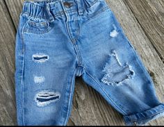 "Distressed ripped denim jeans with holes - so cute with leggings layered underneath!! Perfect for all the babes in your life - little ladies X little gents. Dress them up w/ boots or ballerina slippers; down w/ converse or sandals ... super cute gift! Creatively designed per order, so no two are alike - we kinda dig that ;) Classic vintage medium wash. Various popular brands are used; mostly Old Navy - style and closure type may vary depending upon availability.  Care & Love = delicate wash col Gents Dress, Holey Jeans, Jeans With Holes, Low Jeans, Denim Jeans Ripped, Ballerina Slippers, Navy Style, All Jeans, Red Flannel