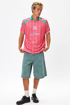 Relaxed fit soccer jersey by Puma with logo script printed at the front. Athletic t-shirt with short sleeves & a knit collar. Features Puma script logo relaxed soccer jersey tee Short sleeve athletic t-shirt Knit collar Script logo graphic Short sleeve Relaxed fit Content + Care 100% Polyester Machine wash Imported Size + Fit Model in Pink is 6’1" and wearing size Medium Measurements taken from size Medium Chest: 46" Length: 29" | Puma Script Logo Relaxed Soccer Jersey Tee in Pink, Men's at Urban Outfitters Logo Script, Pink Fits, Script Logo, Jersey Tee, Soccer Jersey, Popular Style, Logo Graphic, Knit Collar, Fitness Models